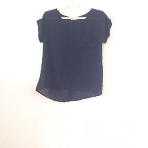 Plum Feathers New York Back Buttoned Linen Top.